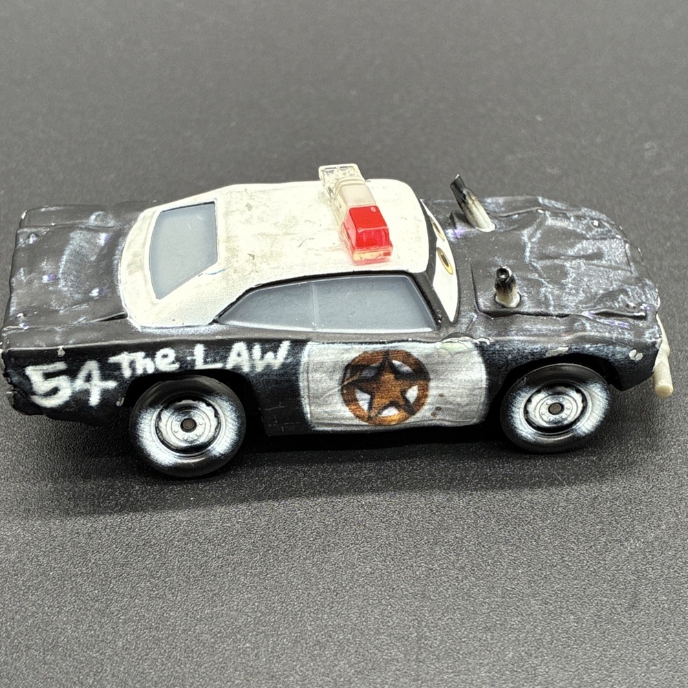 Disney Pixar Cars 3 Thunder Hollow Demolition Derby APB The Law #54 Diecast - Picture 3 of 6